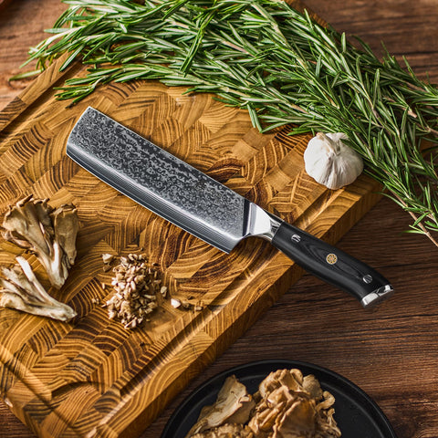 KYOKU 7-inch VG10 Damascus blade edge grind close-up signals sharp, efficient cuts.