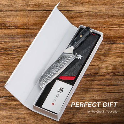 KYOKU Santoku Knife edge polish reveals razor-like sharpness for prep.