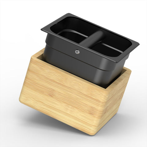 KYONANO coffee knock box with wood exterior and stainless steel liner for clean grounds disposal.