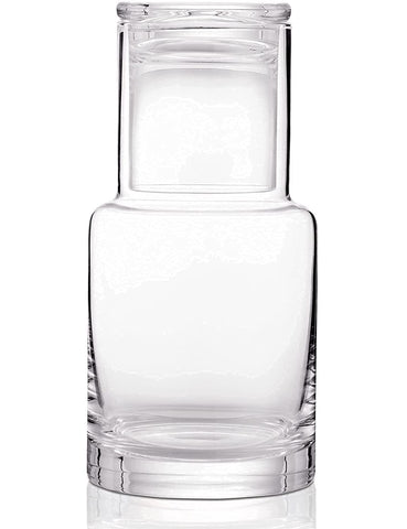 Lancici bedside carafe and glass set on a tidy nightstand for quick, spill-free water access.