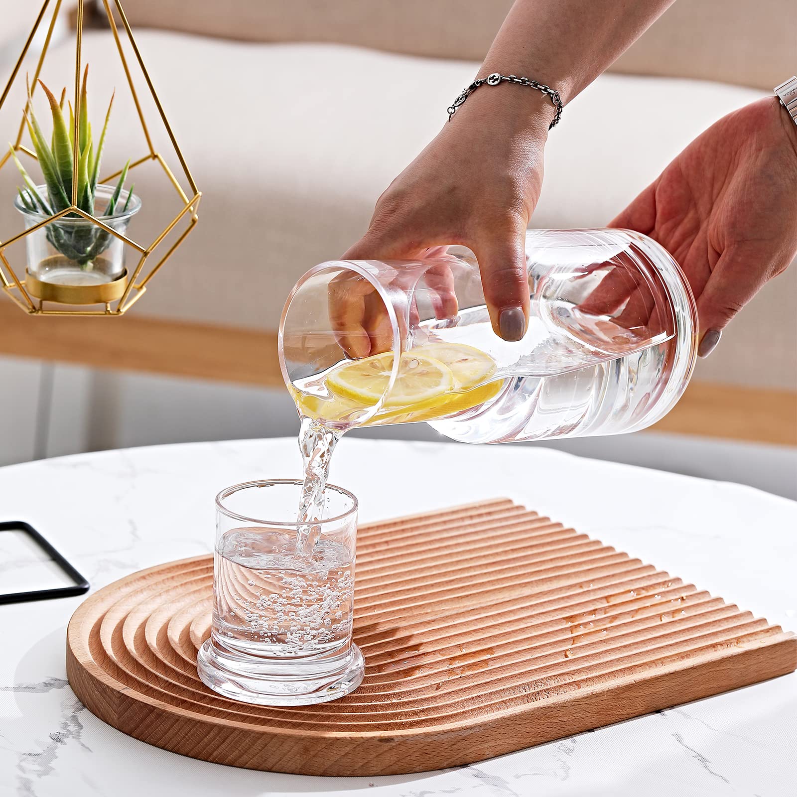 Lancici bedside water carafe with tumbler lid keeps water close for nighttime medicine.