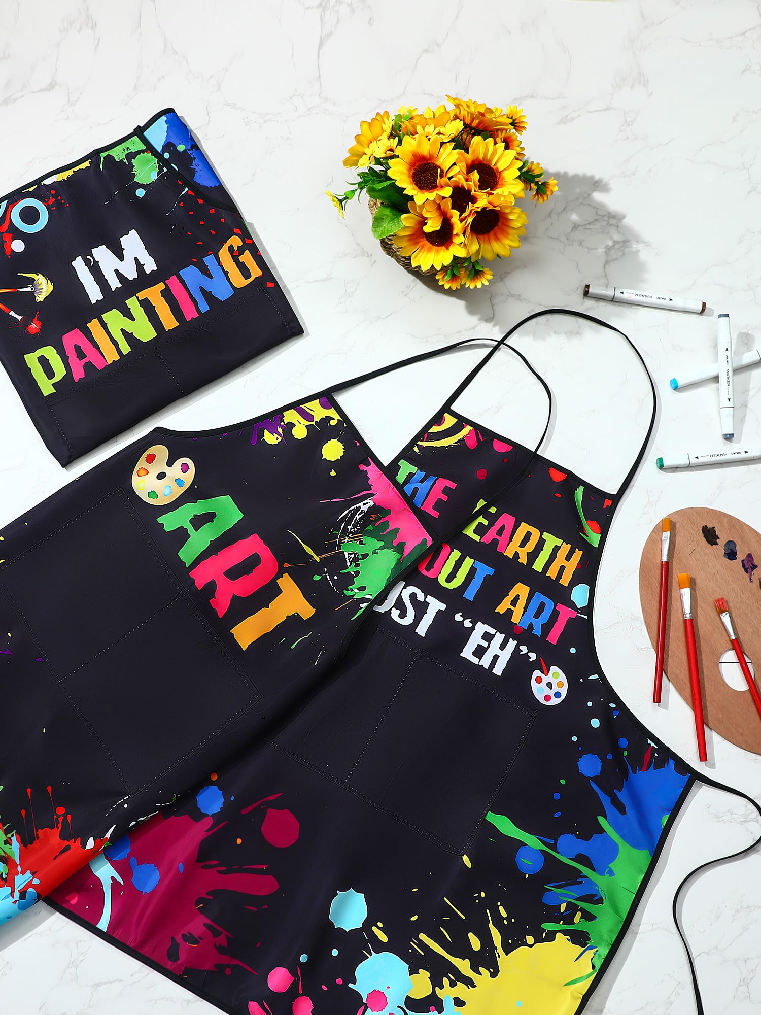 Langyiwee 72 cm length painting apron provides full coverage during messy projects.