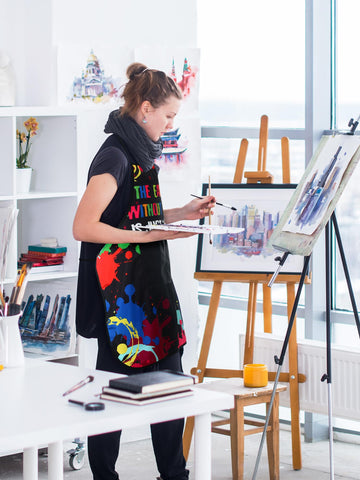 Langyiwee thick waterproof fabric apron keeps outfits dry during various tasks.