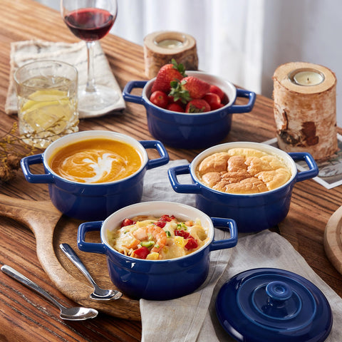 Lareina blue cocotte with handles for easy serving and heat retention.