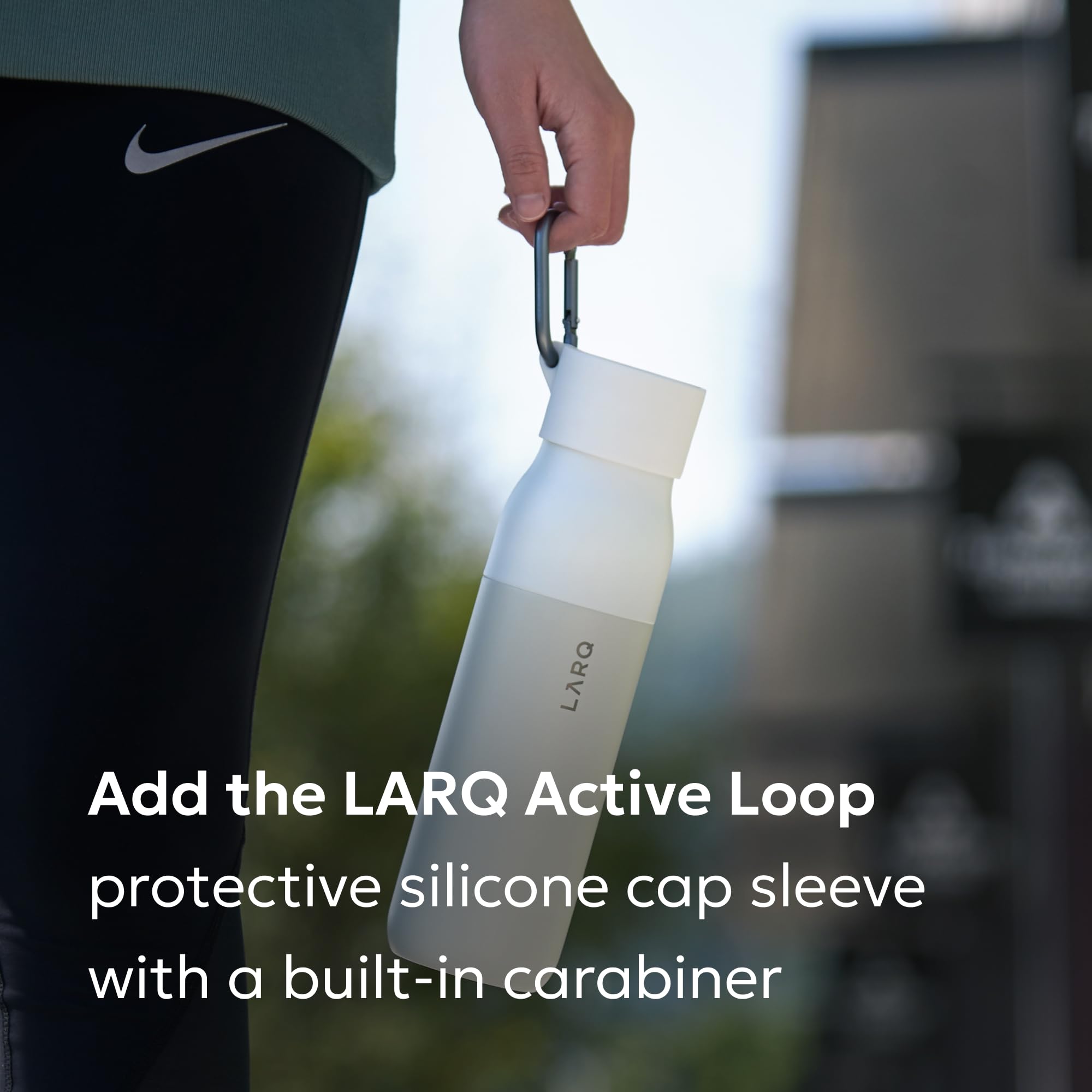 LARQ PureVis bottle in hand evokes portability for travel and daily commutes.