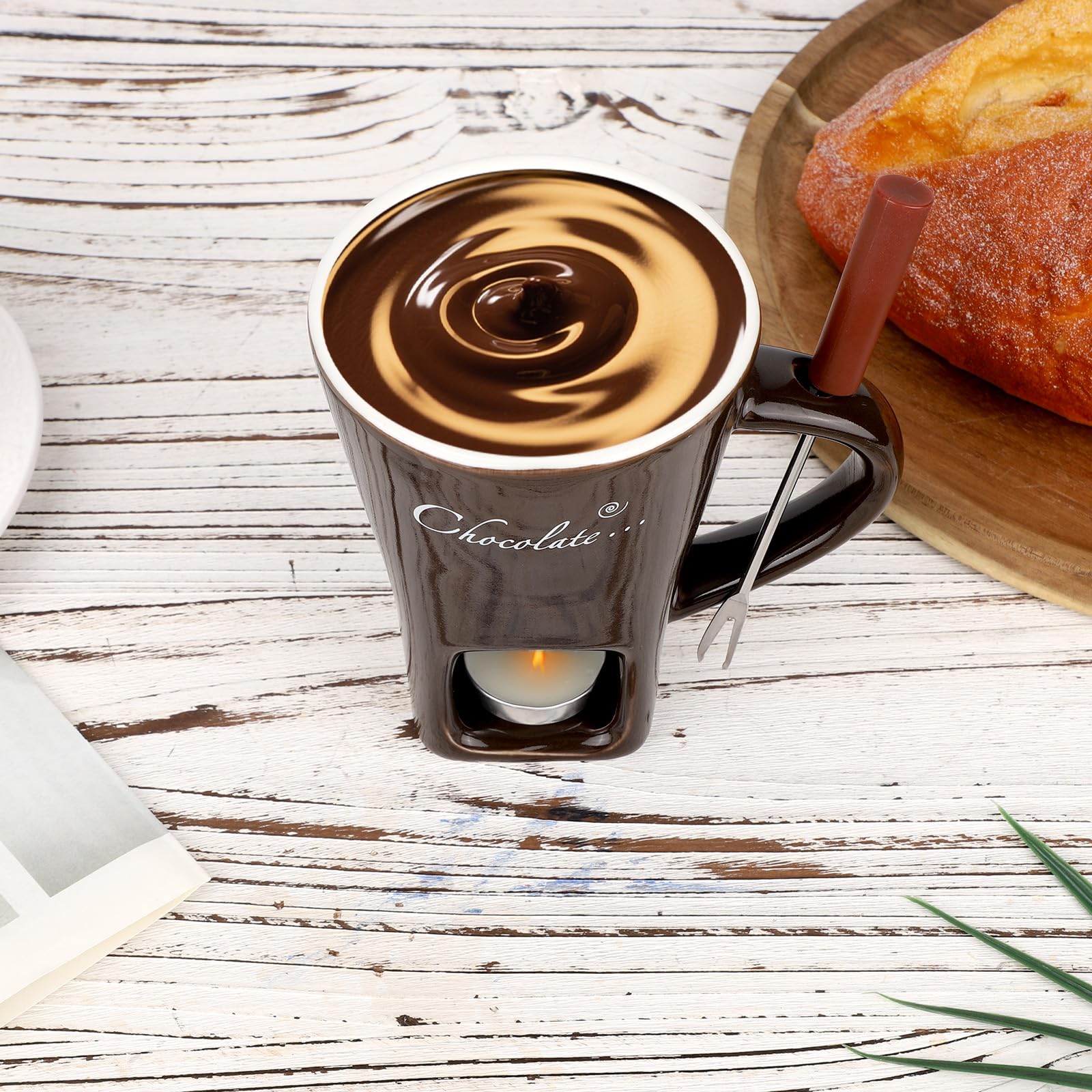 Lasuroa stainless steel fork for safe fondue dipping.