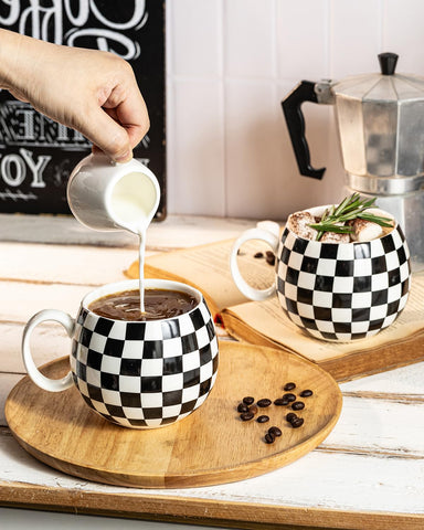 Elegant black-and-white checkered mugs to brighten tables.