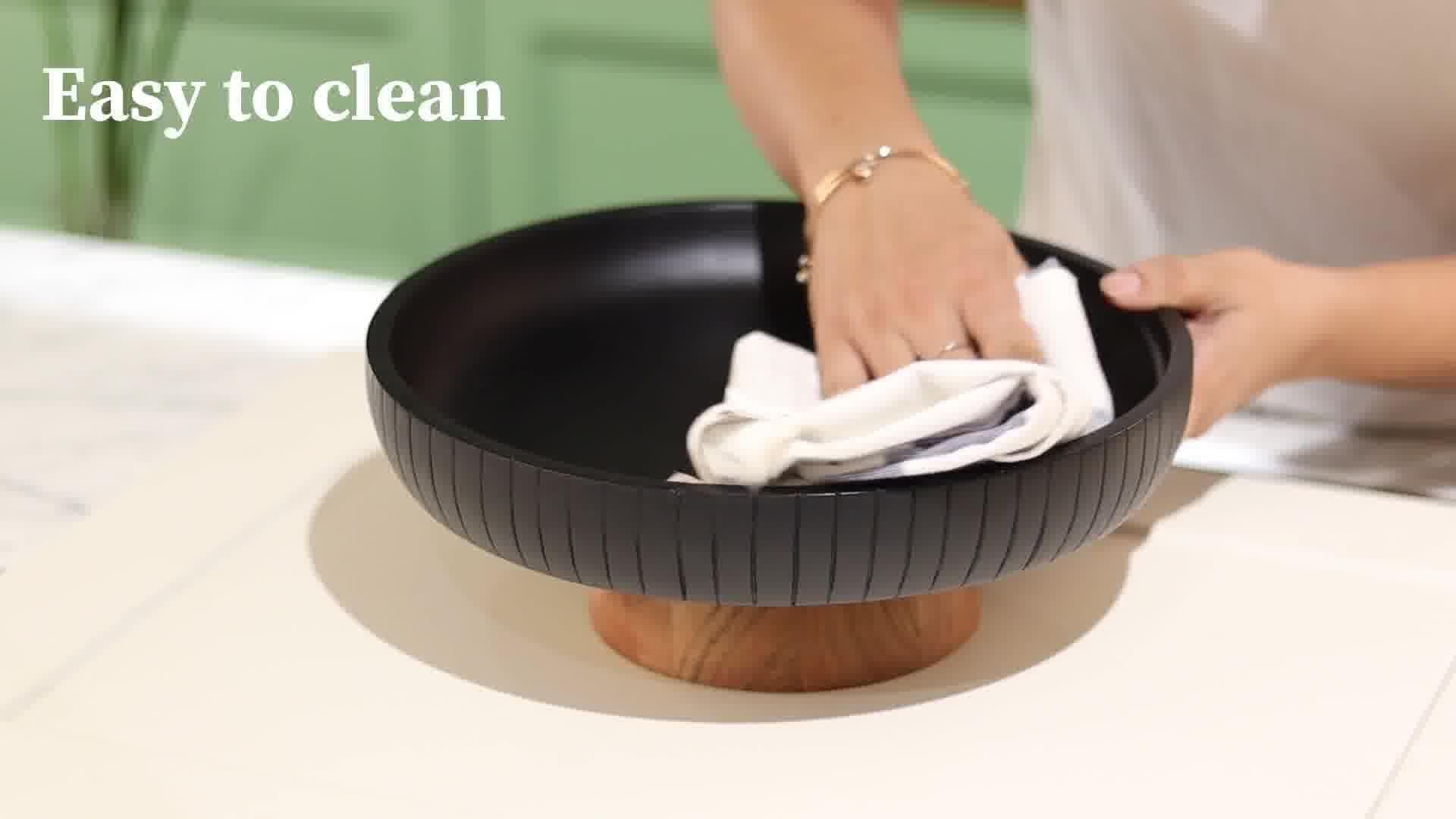 LAVAUK dual-tone pedestal bowl adds versatile decorative storage.