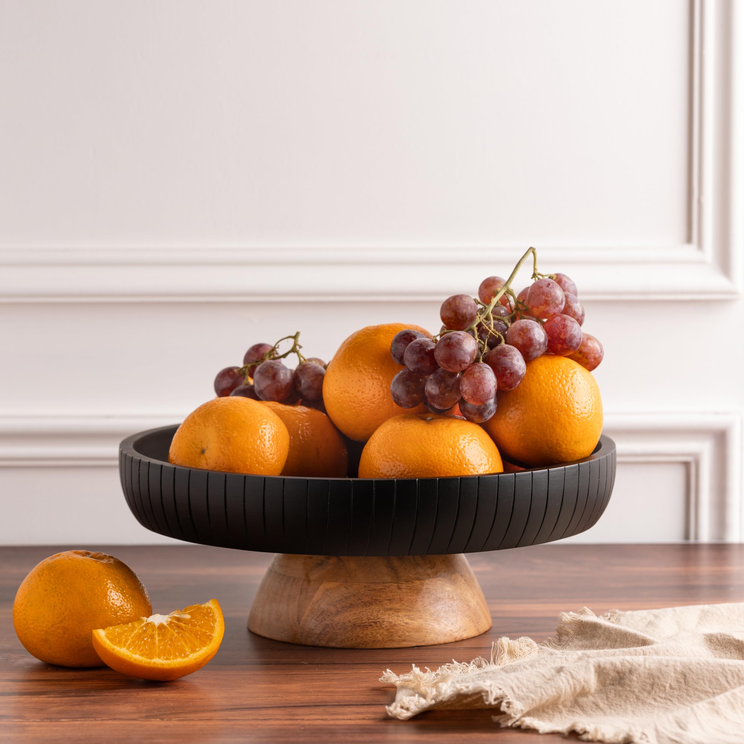 LAVAUK handmade mango wood bowl, perfect for fruit or snacks.
