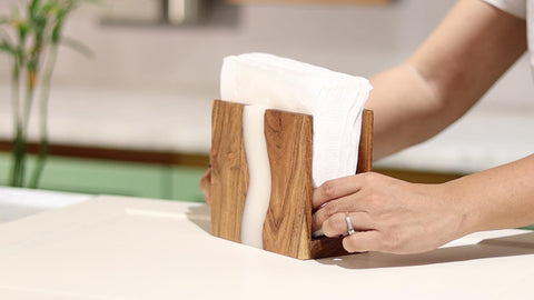 LAVAUK Indoor-outdoor napkin holder keeps napkins organized on tables and counters.