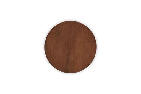 Close up of Le Creuset acacia wood lid showing a tight seal for freshness.
