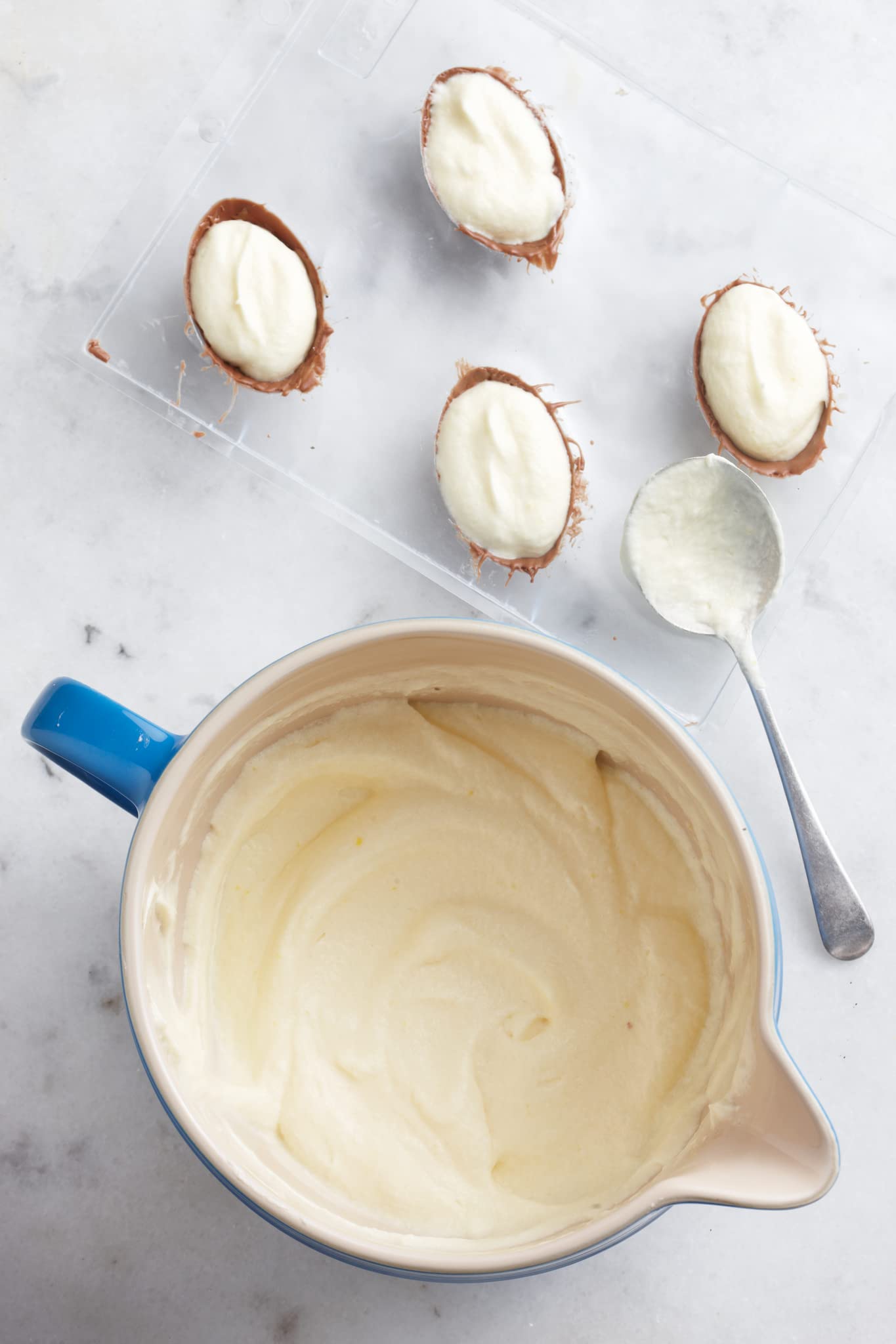 Le Creuset batter bowl close-up highlights chip- and scratch-resistant glaze.