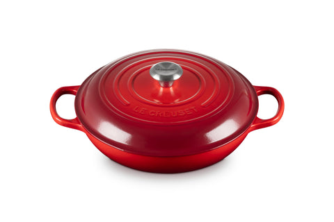 Le Creuset braiser cerise with open lid, even heat for searing.