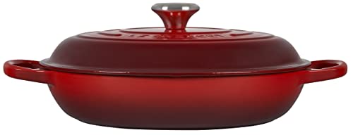 Le Creuset braiser cerise lid circulates steam to lock moisture.