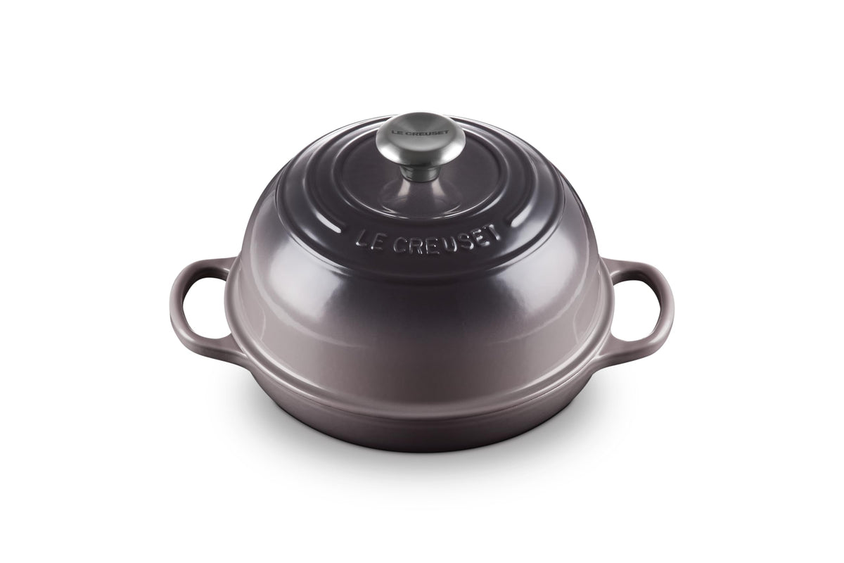 Le Creuset Bread Oven shown with a domed lid trapping steam for a crispy crust