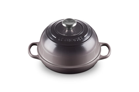 Le Creuset Bread Oven shown with a domed lid trapping steam for a crispy crust