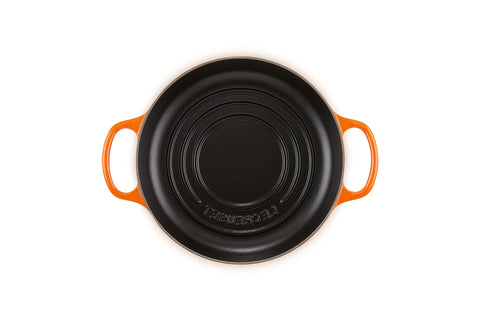 Le Creuset Bread Oven Flame low-profile base promotes even browning.