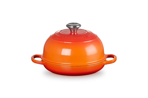 Le Creuset Bread Oven Flame lid with steam-trap design for crisp crust.