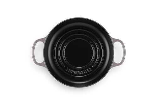 Le Creuset Bread Oven porcelain enamel finish resists staining and sticking