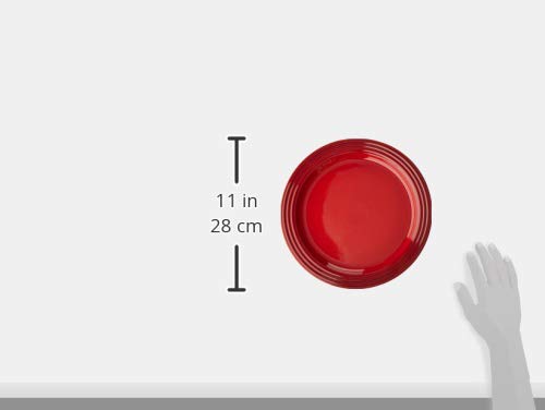 Le Creuset Cerise plate is dishwasher-safe for easy cleanup