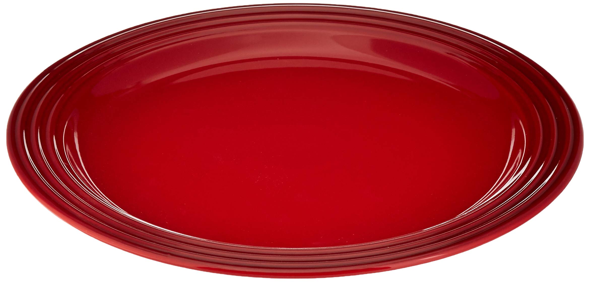 Le Creuset Cerise plates stacked for stylish everyday tableware