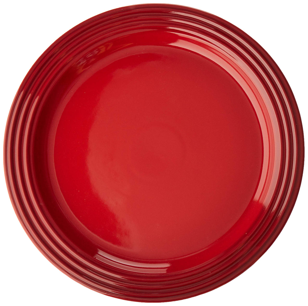 Le Creuset Cerise dinner plate top view showing vibrant glaze for elegant dining