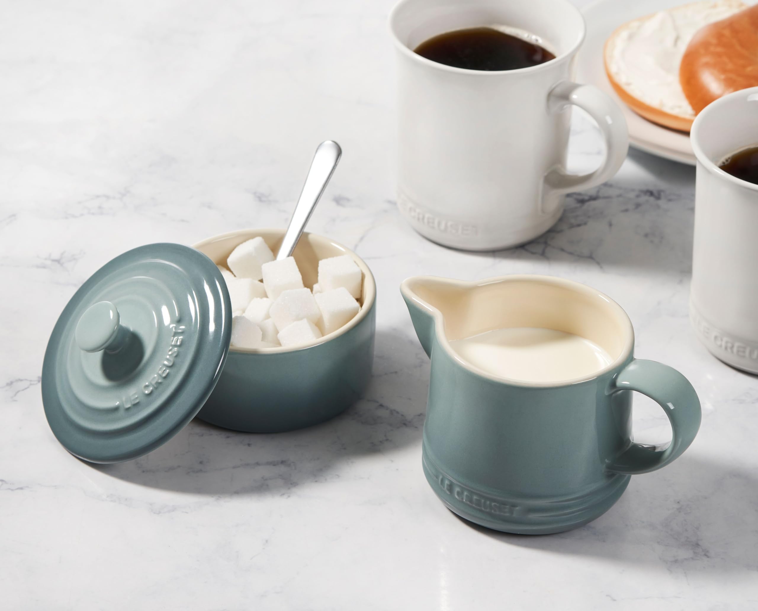 Cerise Le Creuset stoneware on display in kitchen for a cohesive look