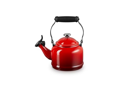 Le Creuset Demi Tea Kettle Cerise side view emphasizes durable carbon steel construction.