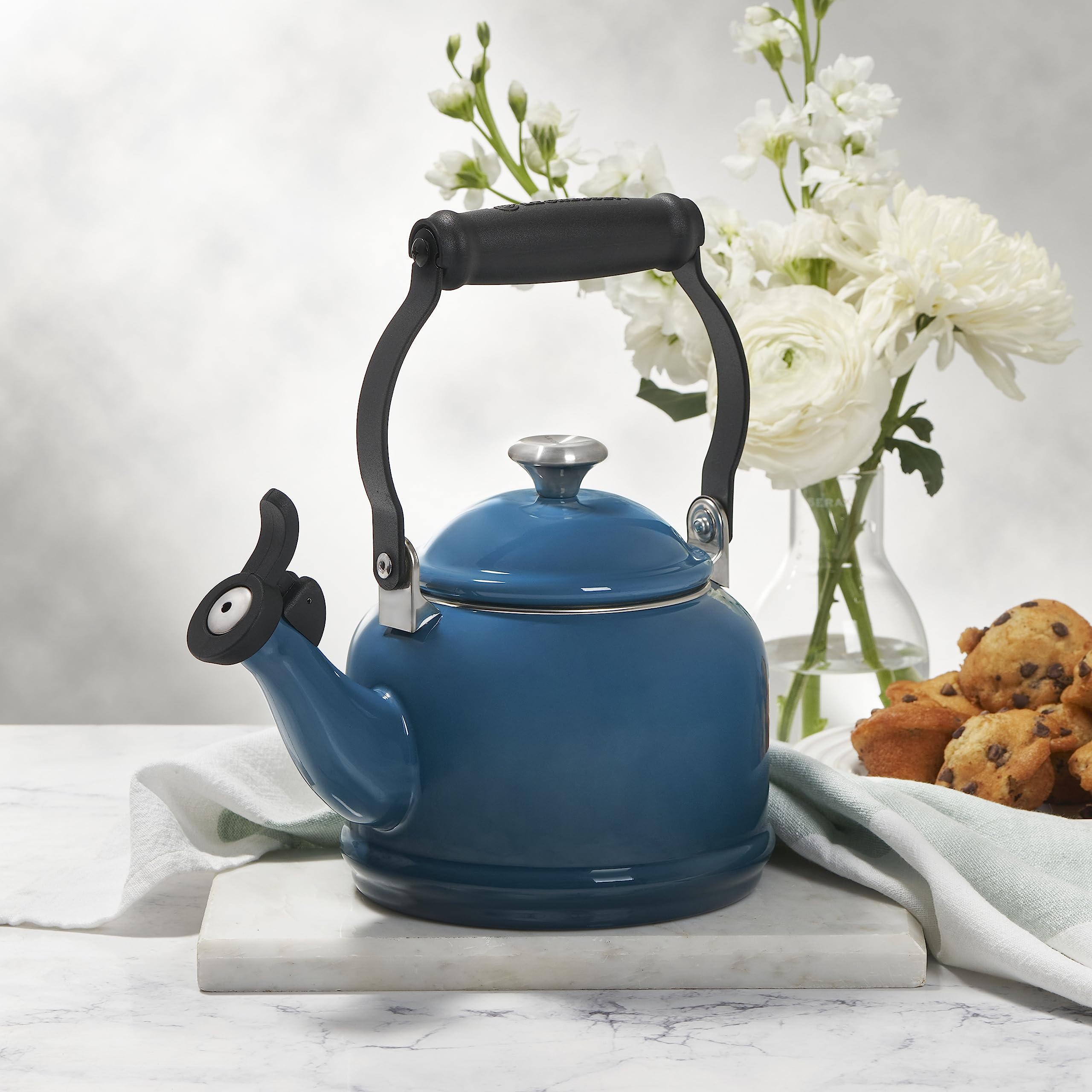 Le Creuset Demi Tea Kettle Flame adds vibrant color to your kitchen.