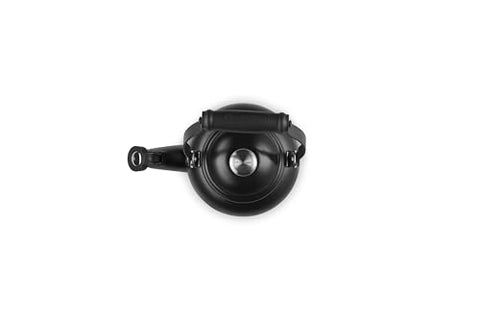Le Creuset Demi Tea Kettle in Licorice — signature knob and embossed handle for a secure grip.