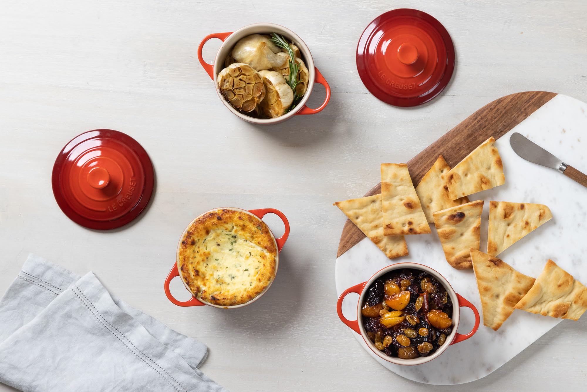 Dishwasher-safe Le Creuset stoneware works with metal utensils for easy care.