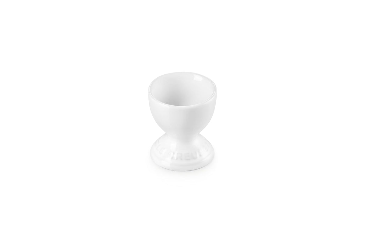 Le Creuset egg cup 2-inch white with smooth glaze for easy release.