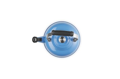 Le Creuset enamel close-up shows non-reactive, stain-resistant surface for easy cleaning.