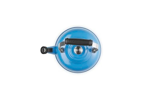 Le Creuset enamel close-up shows non-reactive, stain-resistant surface for easy cleaning.