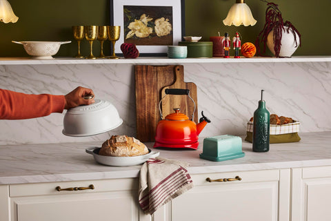 Le Creuset pouring action with flame kettle in use