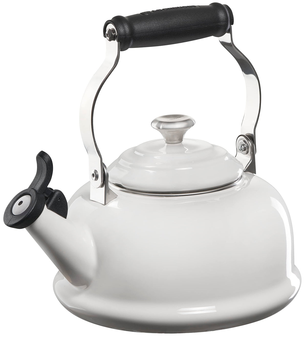 Le Creuset whistling tea kettle front view highlights quick heat and vibrant enamel finish.