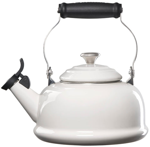 Le Creuset whistling tea kettle spout pour demonstrates smooth pouring for tea or coffee.