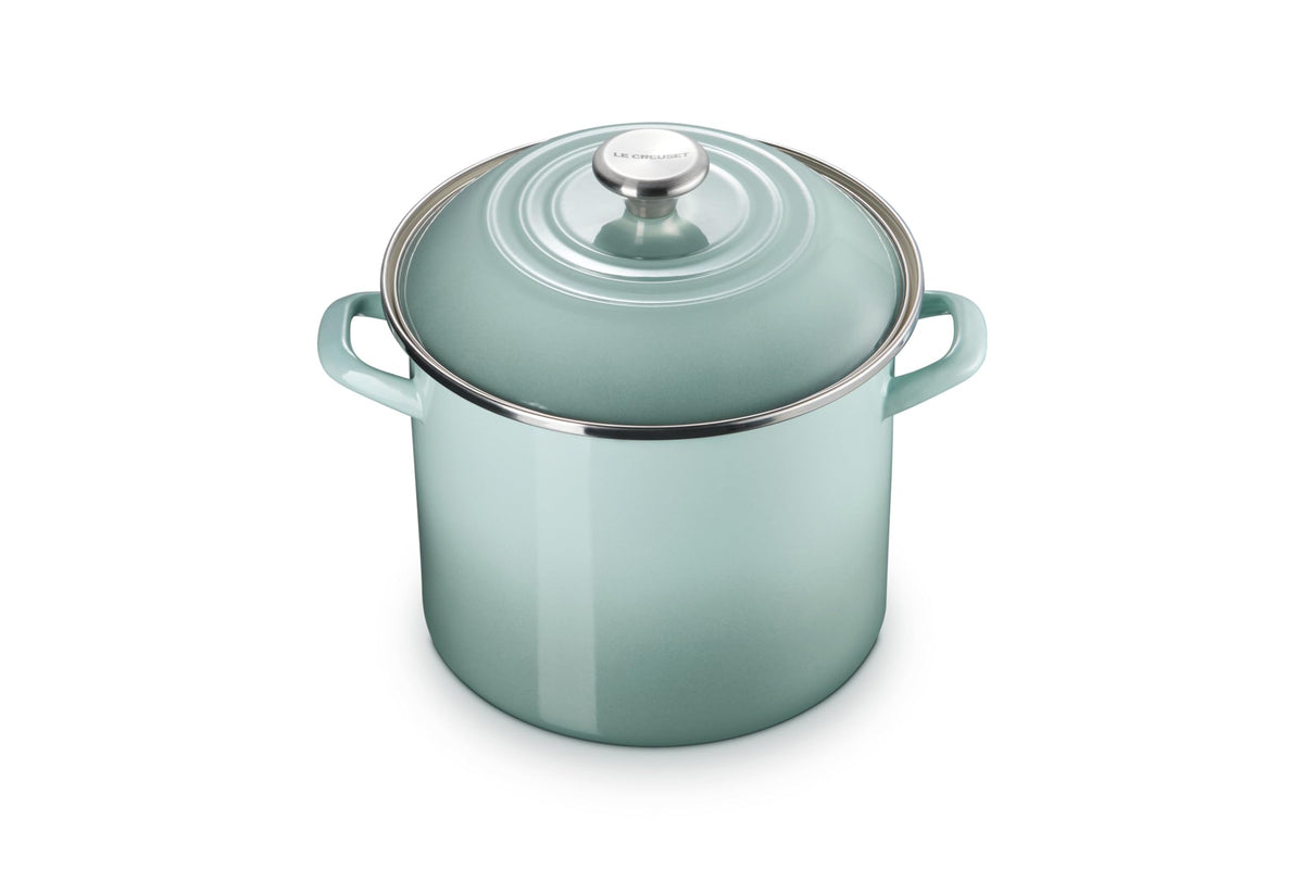 Le Creuset enamel steel stockpot exterior in Sea Salt heats quickly for soups.