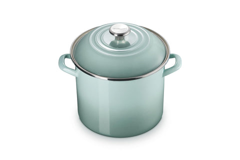 Le Creuset enamel steel stockpot exterior in Sea Salt heats quickly for soups.