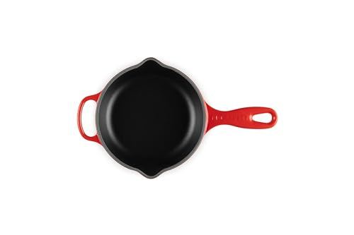 Le Creuset enameled cast iron interior Cerise satin shows high-heat capability