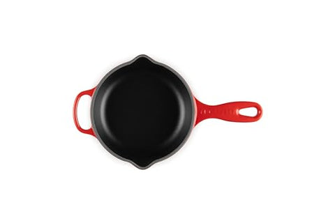Le Creuset enameled cast iron interior Cerise satin shows high-heat capability