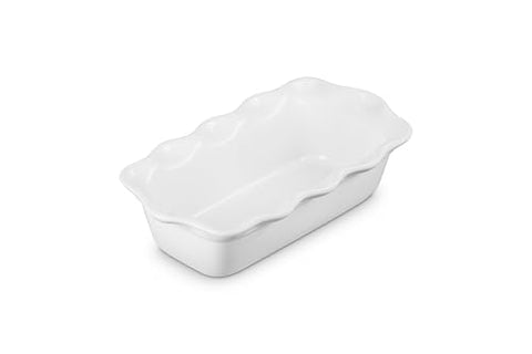 Le Creuset Fluted Loaf Pan in white glaze releases cleanly for neat slices.