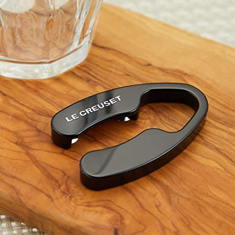 Le Creuset foil cutter in black enabling effortless one-step foil removal.
