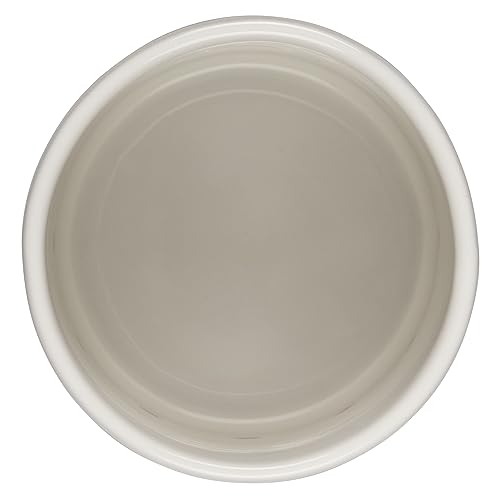 Glossy glazed interior of Le Creuset garlic keeper for easy garlic release.