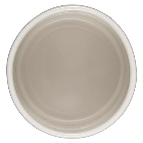 Glossy glazed interior of Le Creuset garlic keeper for easy garlic release.
