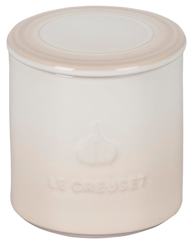 Le Creuset Garlic Keeper Meringue on countertop keeps ready-to-use garlic at hand.