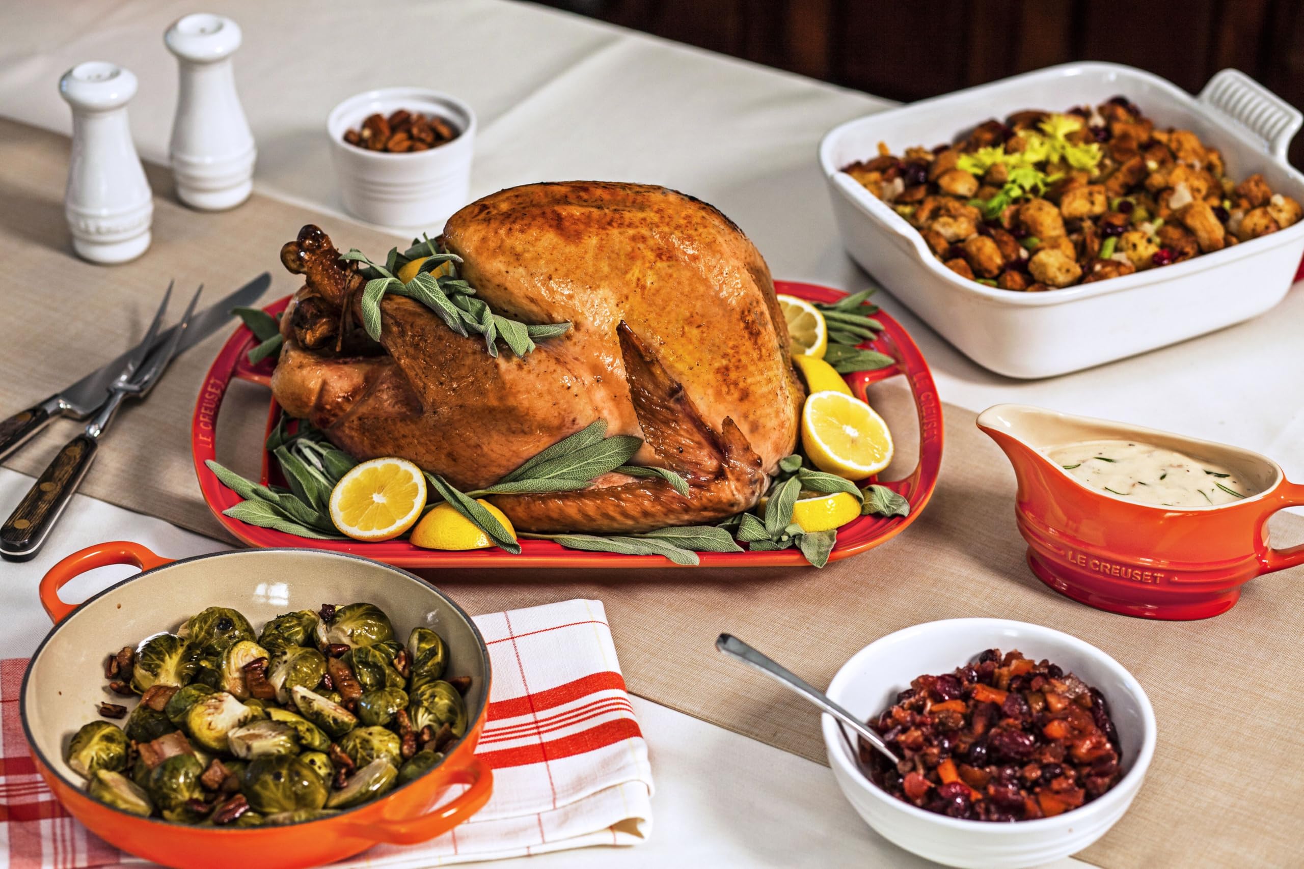 Le Creuset salt and pepper set—gift-ready, timeless white stoneware.