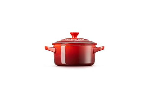 Cerise cocotte retaining heat to keep dishes warm at the table.