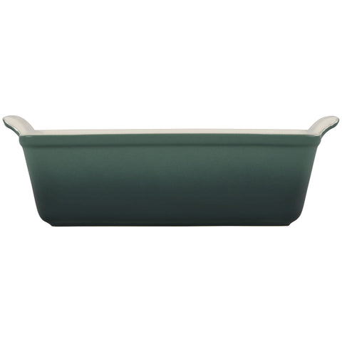 Le Creuset Heritage Loaf Pan in Artichaut, oven-ready finish preserves warmth for serving.