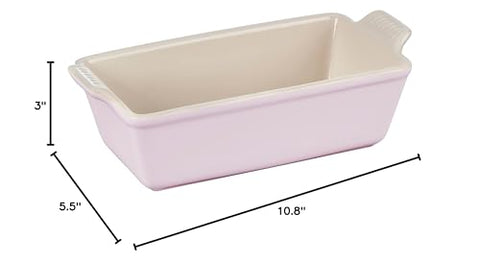 Le Creuset Heritage enamel interior resists stains and simplifies food release.